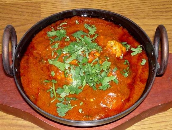 Balti curry dishes are traditionally cooked in a special Balti pan with two handles. You can use a wok or deep frying pan instead. These unique curries are cooked very quickly.