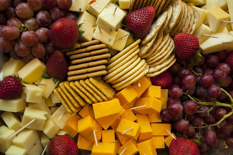 The appeal of a cheese platter is improved by the layout but nothing beats high quality attractive cheese selections