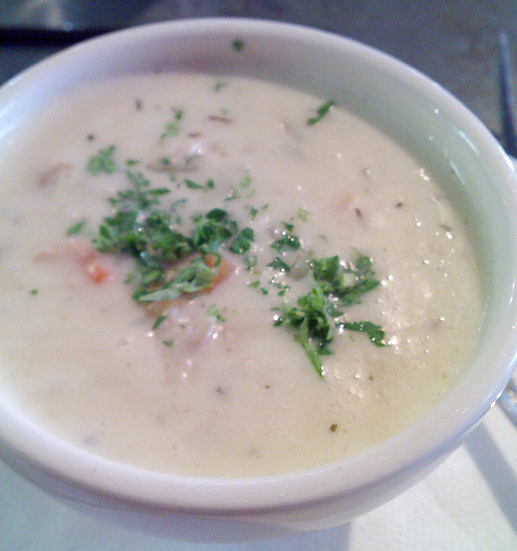 The classic clam chowder. See this recipe for a variation that includes fish, green beens potatoes, celery and leek., which provide interesting texture to the dish