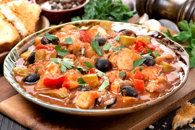 Vegetables and herbs enhance the texture and taste of a fish stew adding complexity