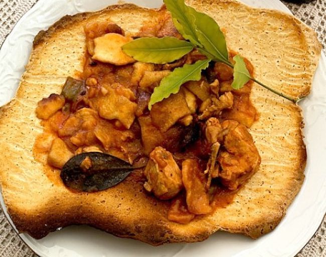 The Gazpachos Manchegos meat stew served on the unleavened bread cakes. See the recipes here
