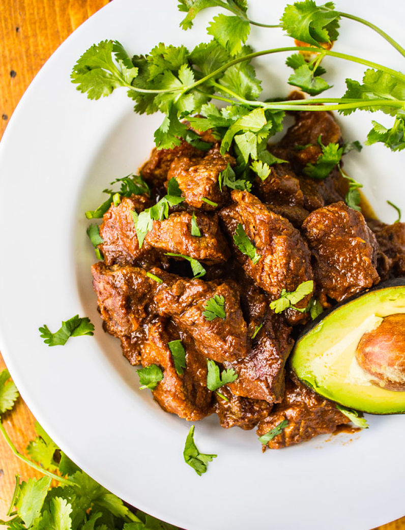 Add fresh herbs, chillies and spices to enhance the flavor and appeal of Carne Guisada