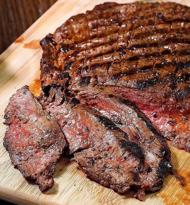 Grilled Flank Steak cooked to perfection and rested before serving