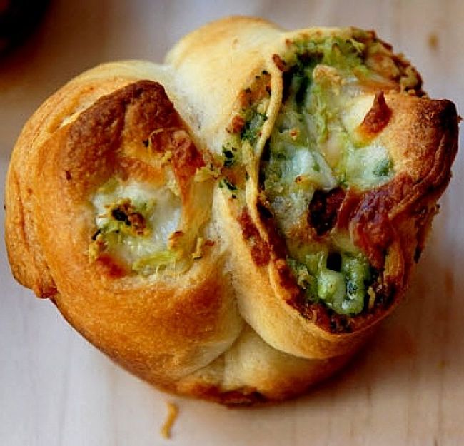 Pesto is a delightful addition to many baked goods stuffed with sauces and other inclusions