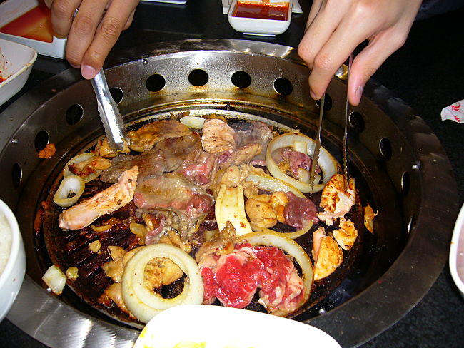 The communal cooking aspect of a Korean barbecue adds to charm and appeal. Each friend or guest can choose what they want and cook it themselves.
