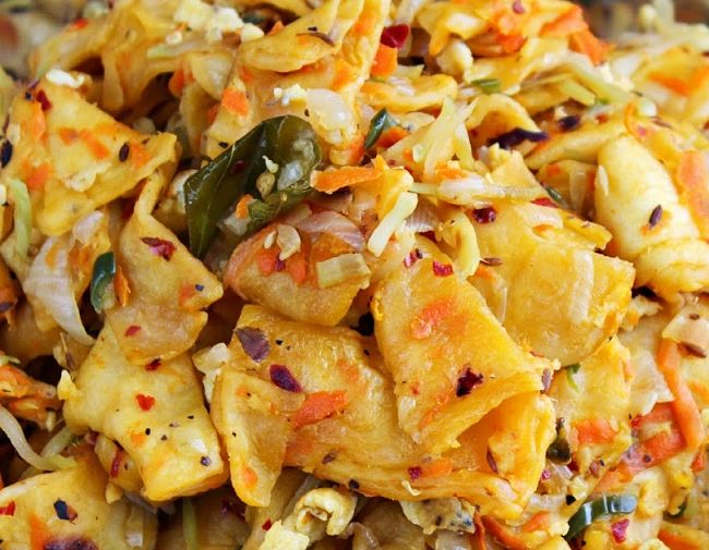 Genuine Kottu Roti, can be easily made at home from a variety of easily accessed spices, leftover curry, vegetables and your choice of meats