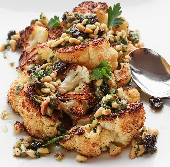 Grilled fish with pine nuts and dried fruit combination