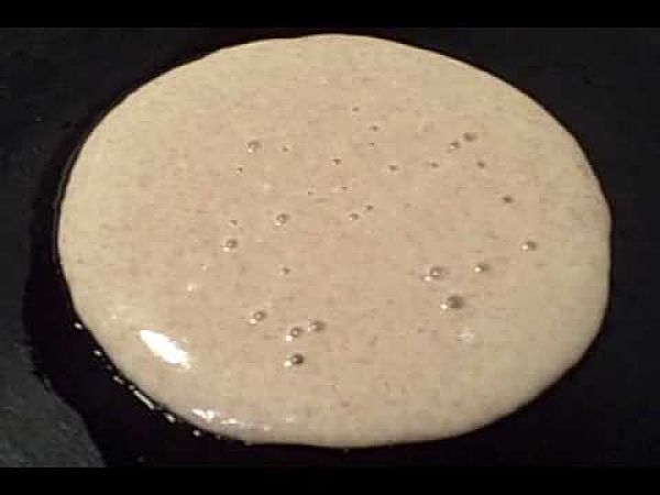 Wait until most of the bubbles have popped before flipping the pancakes over to cook on the second side 