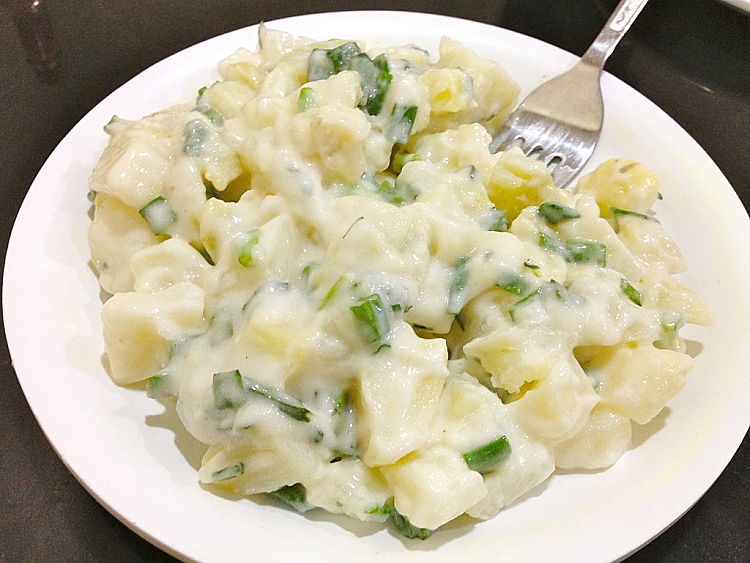 The creaminess of a potato salad means that you have to add more herbs and flavors than you use for other dishes. Don't hold back, but don't overdo it either.
