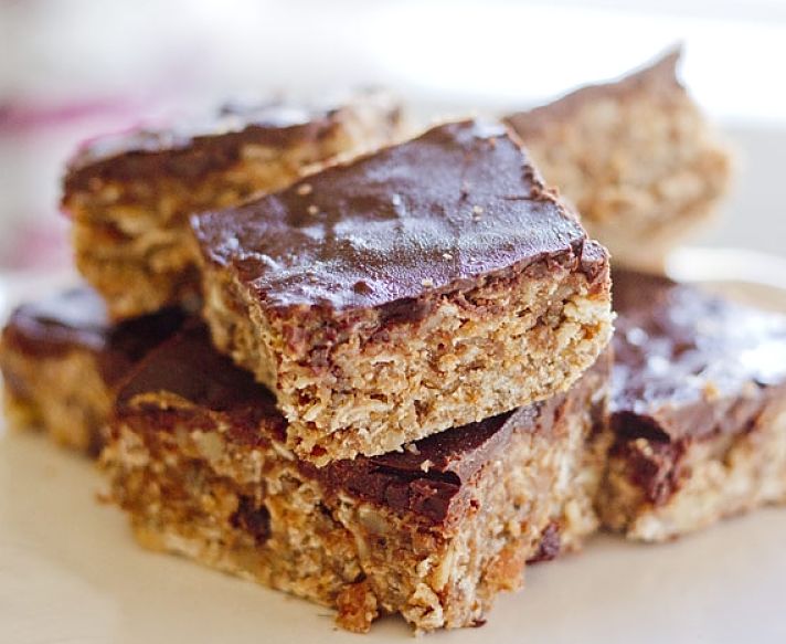The nutrients in protein bars can be boosted by rolling them in a variety of seeds, nuts, protein powder and rolled oats.