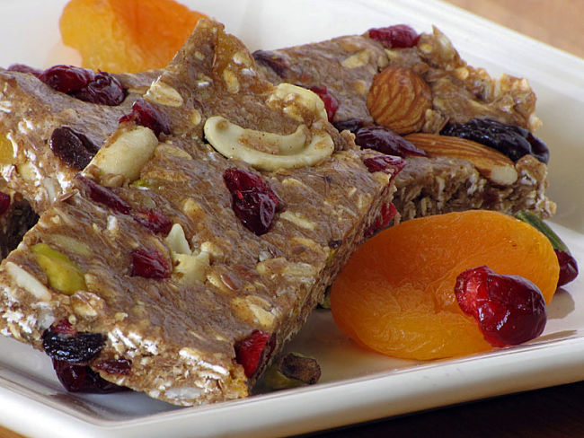Ganola bars with dried fruit such as apricots and nuts is a fabulous healthy snack to provide and energy and nutrient boost when the mood and energy levels flags.