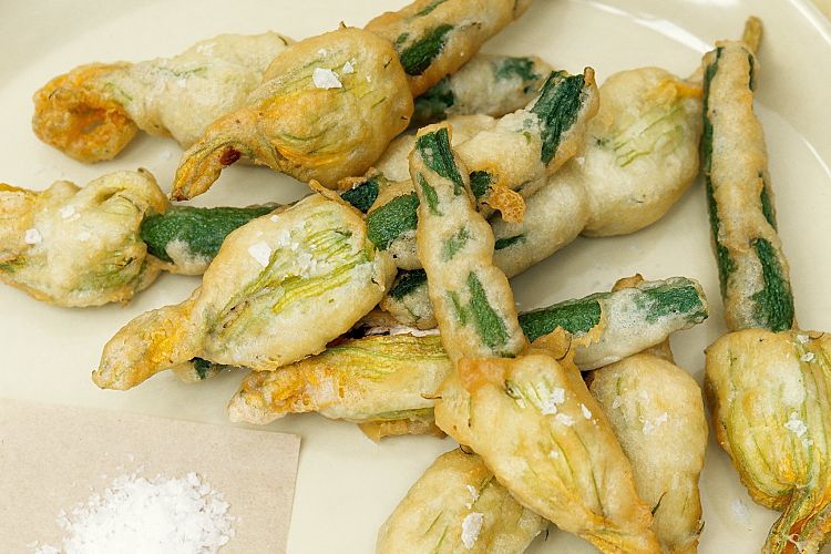 Deep fried stuffed pumpkin flowers are  delight that will be enjoyed by the entire family. 
  See the great recipes in this article.