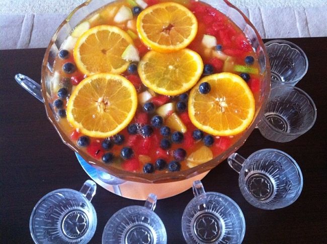 An alcoholic punch can really boost the mood at a party. See many great recipes here.