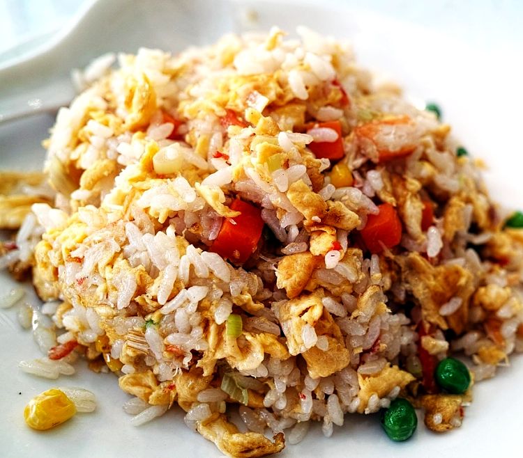 Vegetables and meat cubes add to the flavor of homemade fried rice. See the great recipe here