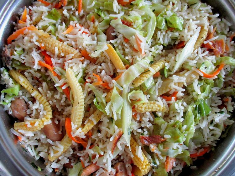 Salad ingredients such as cabbage strips are delightful with fried rice, as well as fresh herbs and chillies