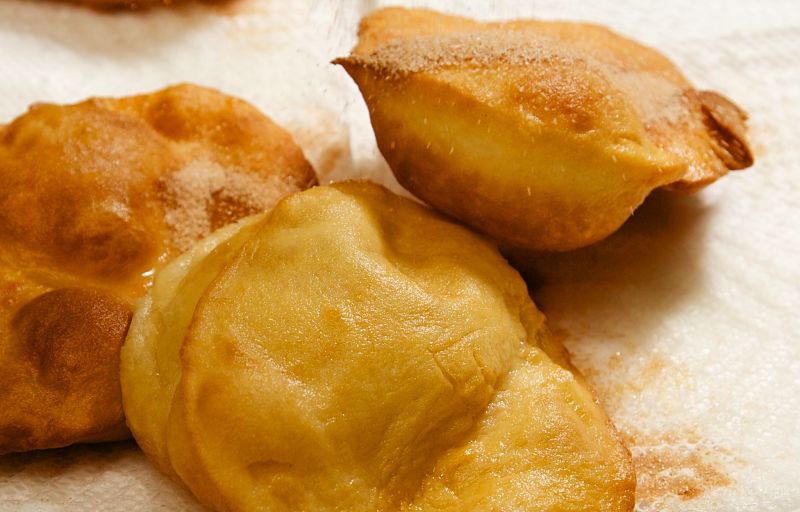 Sopapilla 'pillows' are hollow and the cavity can be filled with cheese, honey and various sauces