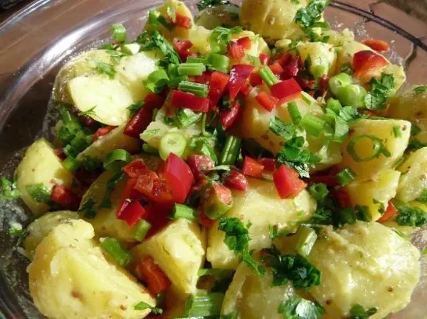  Adding chopped vegetables, fresh herbs and spices makes a perfect potato salad side dish for grills, roasts and barbecues