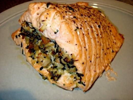 Delightful Salmon stuffed with walnuts and herbs. See the recipe and also one for a spicy tahini sauce to go with it