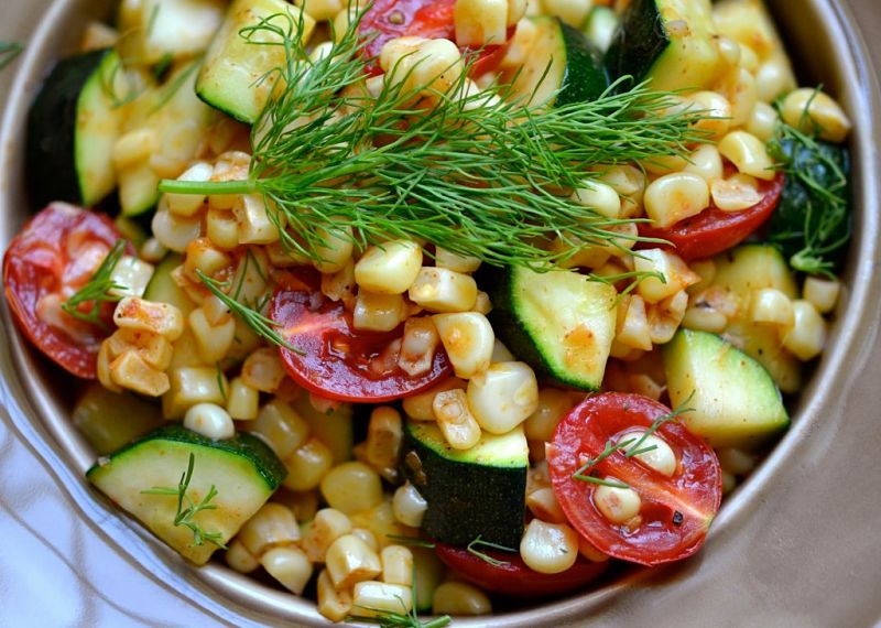 Tomatoes make a delightful addition to a basic succotash