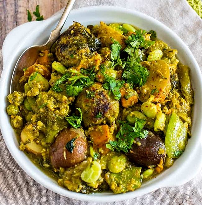 Simplified Gujarati Undhiyo Indian Vegetable Curry Recipe you can make at home to experience the delightful taste and aroma of the spice mix and fresh herbs