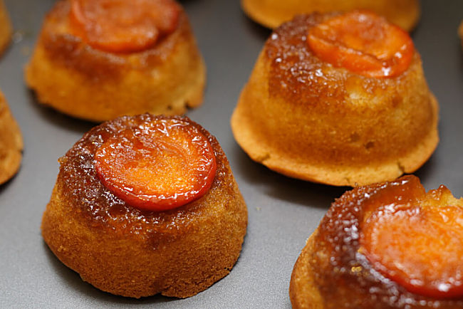 Upside down muffin with a dried apricot and sugar syrup