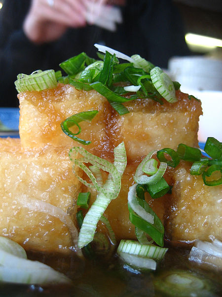 Crispy skin tofu is a delight when served with a homemade tomato sauce