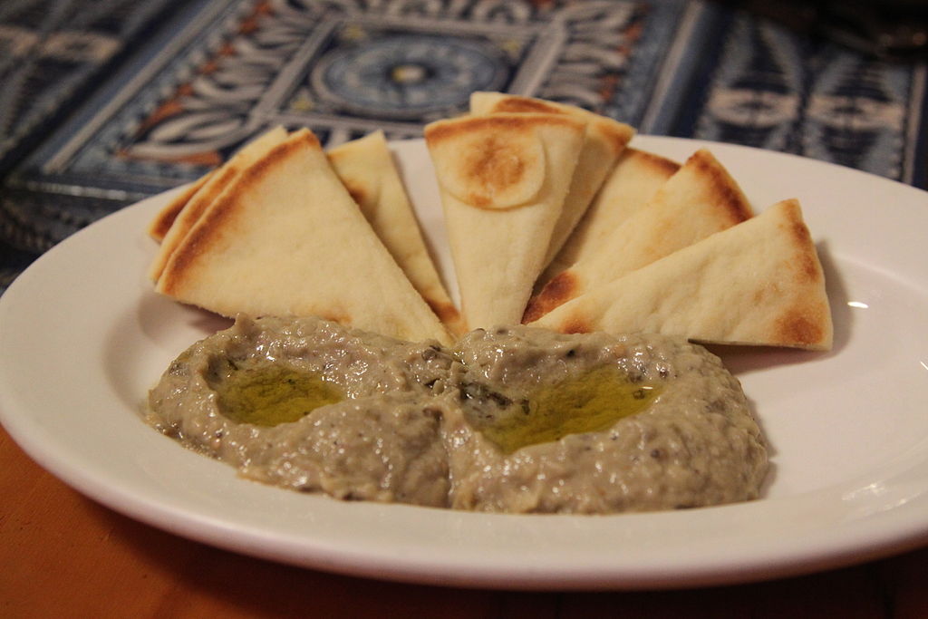 Baba Ganoush can be easily made at home. There are 4 key elements: charred grilled eggplant, garlic, Tahini and lemon juice. Learn the secrets here