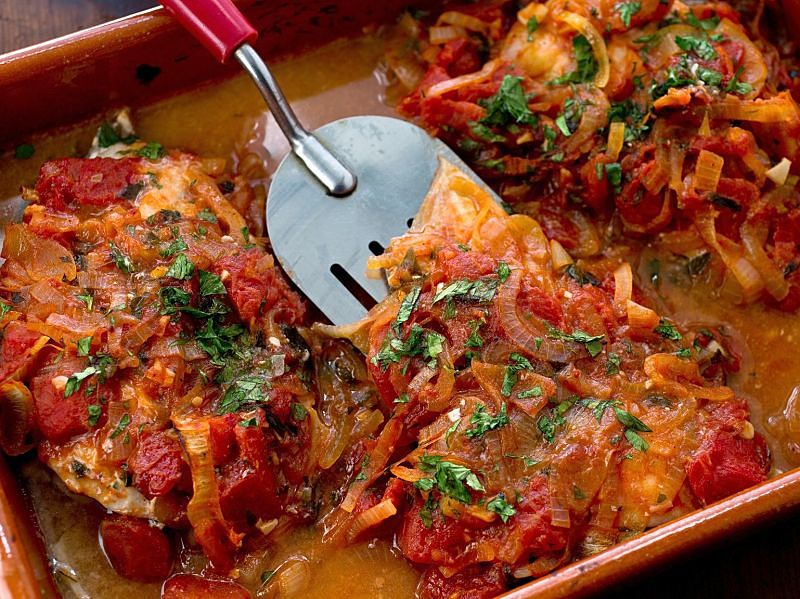 Adding vegetables onions and herbs adds to the taste and appeal of baked fish dishes