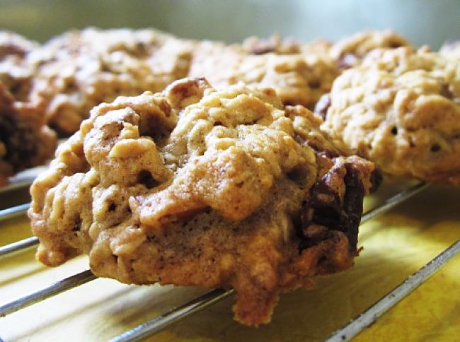 Oatmeal cookies cooking just prior to serving warm