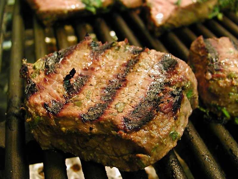 Flank steak needs to be seared over very high temperatures to seal in the juices. Slicing it thinly also helps. Flank steak is lean, flavorful and healthy