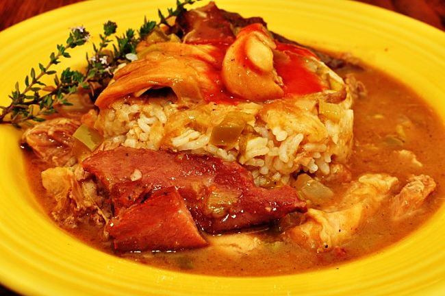 Spicy chicken gumbo with pickled pork and fresh vegetables