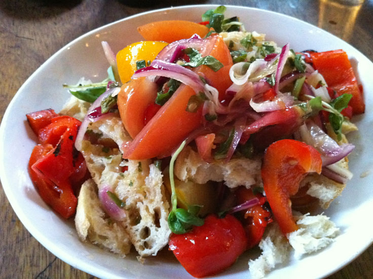 Lovely Panzanella Salad includes bread that soaks up the juice of the roasted tomatoes, basil and other herbs. Delicious!