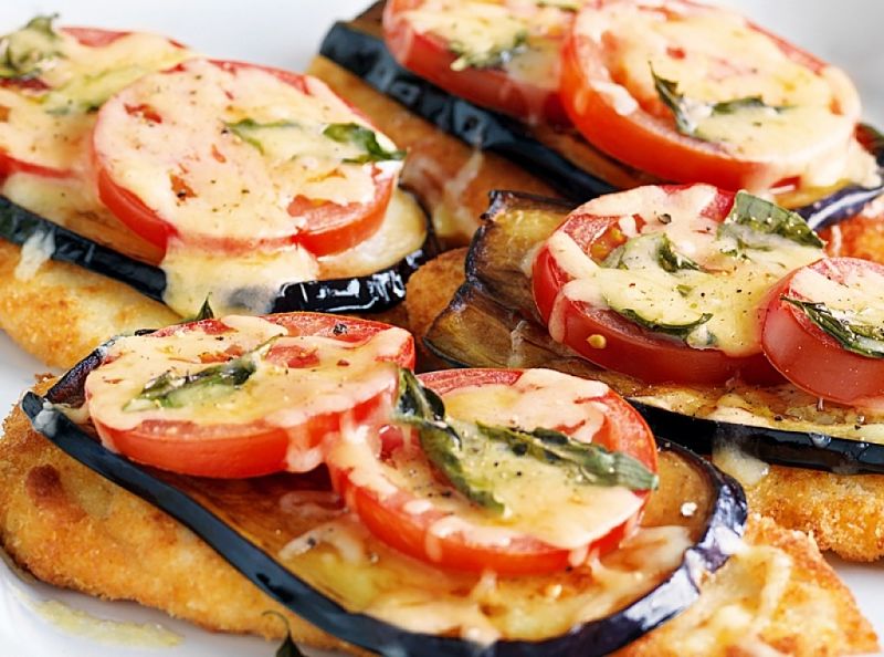 Chicken Parmigiana topped with Eggplant Slices 