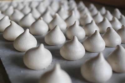 Homemade meringues marching like soldiers